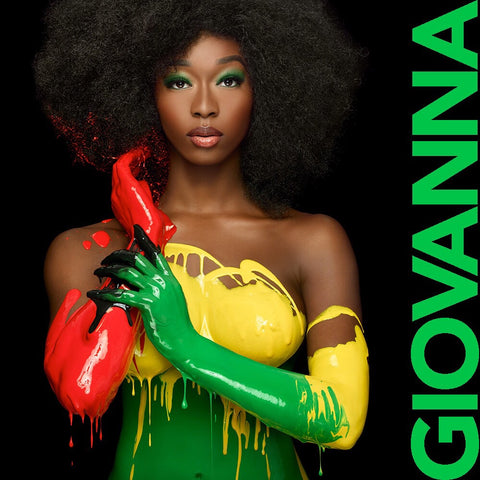 Model Giovanna in red, green and yellow in Guinea-Bissau flag paint by Nick Saglimbeni for Painted Princess Project.